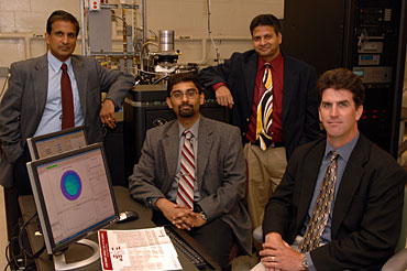 Iowa State's atom probe microscope team: Krishna Rajan, Sriram Sundararajan, Balaji Narasimhan and Andrew Hillier