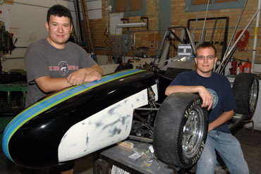 Tony Sartor and Ryan Ellis with the Iowa State Formula SAE race car